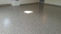 Westminster three car garage had a flake floor installed by us with a fast turn around.